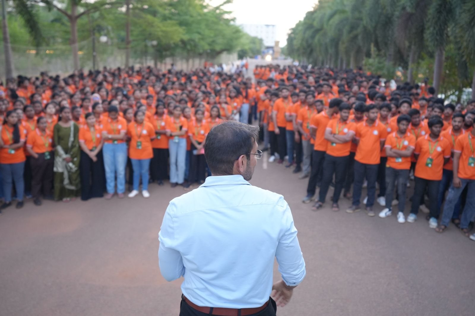 Speaker addressing the full cohort of students on campus